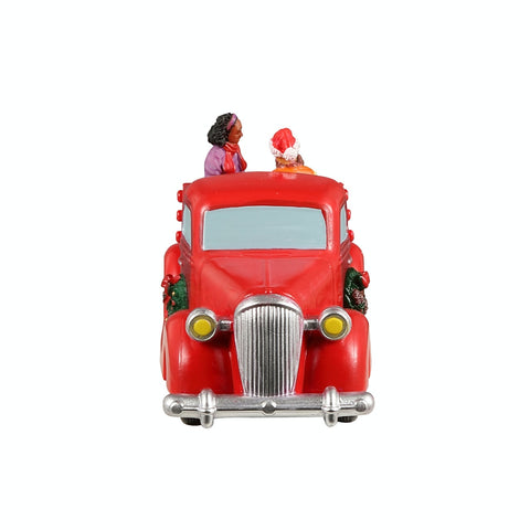 Promenade en camion rouge - Village Lemax