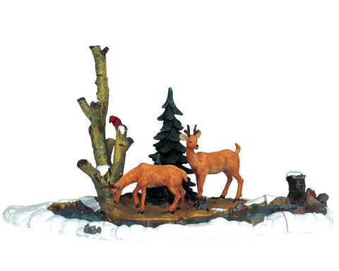 Nourrissant les cerfs - Village Lemax