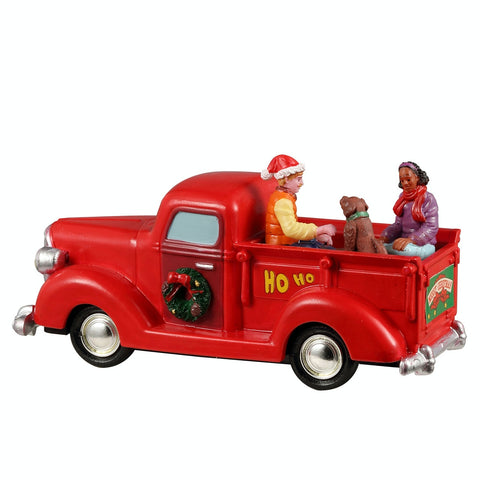 Promenade en camion rouge - Village Lemax