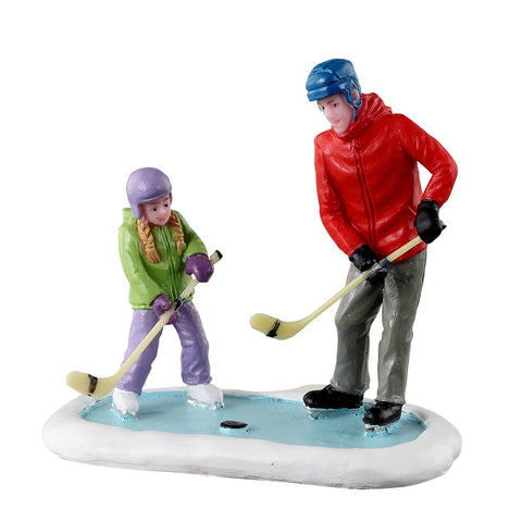 Hockey père et fille - Village Lemax